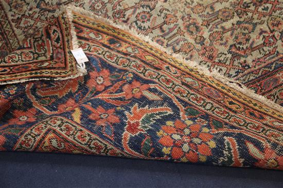 A large North West Persian cream ground carpet, 16ft 5in by 13ft 8in.